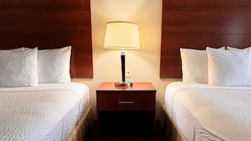 Pillowtop beds, desk, blackout drapes, iron/ironing board