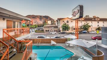 Outdoor pool, a heated pool, sun loungers