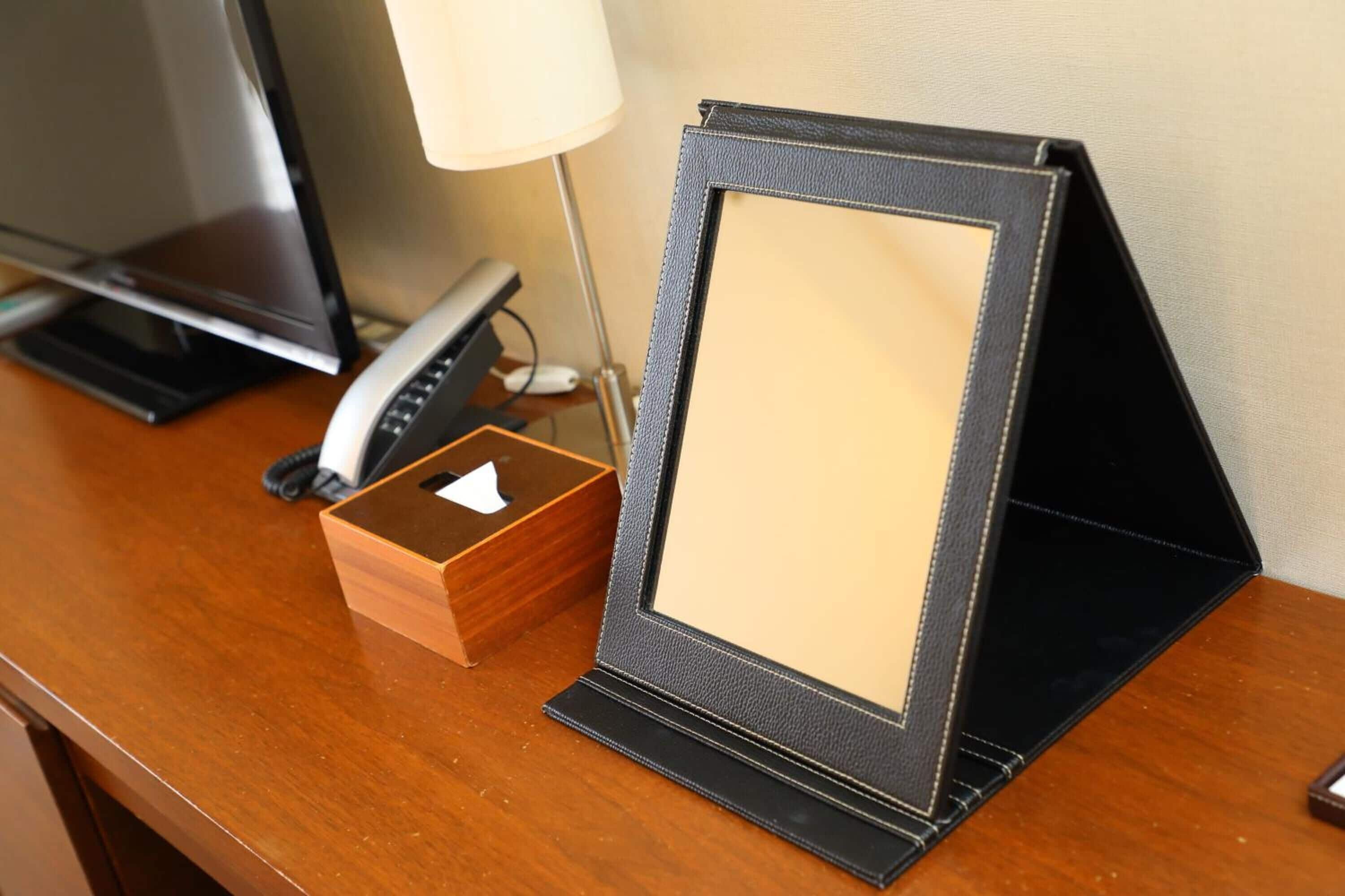 premium bedding, down duvets, memory-foam beds, desk