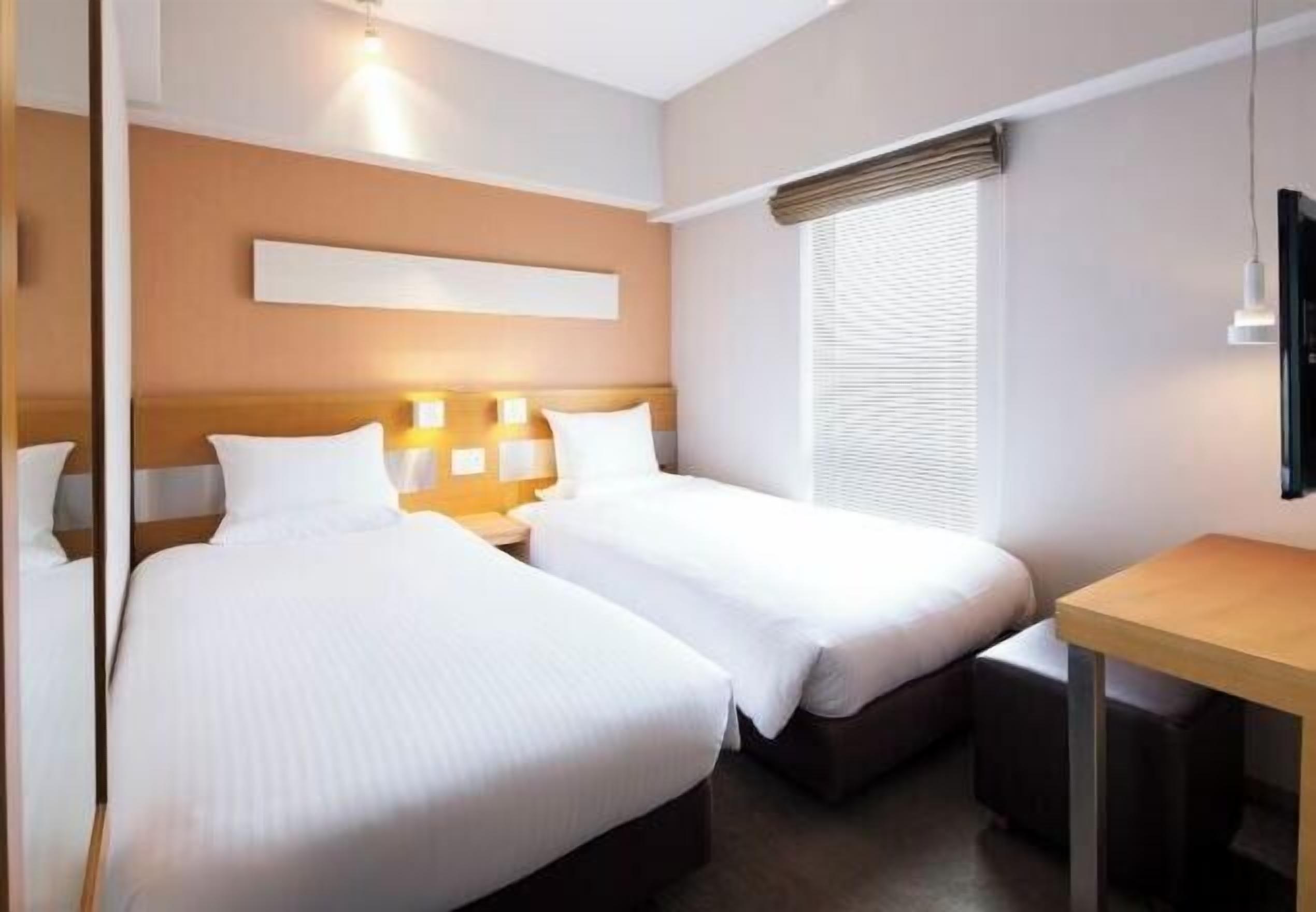 Premium bedding, down duvets, memory-foam beds, desk