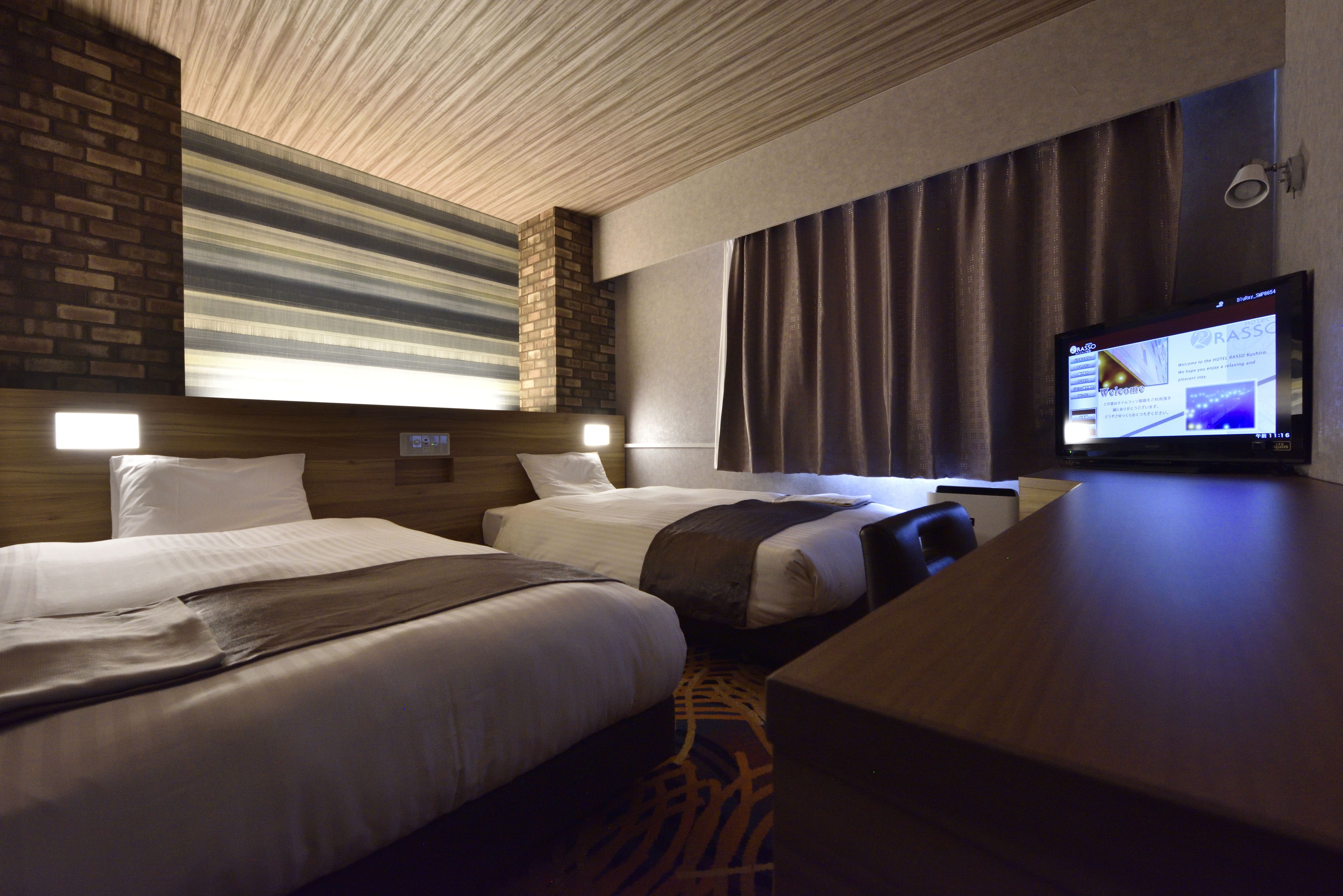 deluxe twin room, 2 bedrooms, non smoking | down duvets, desk, laptop workspace, free wifi