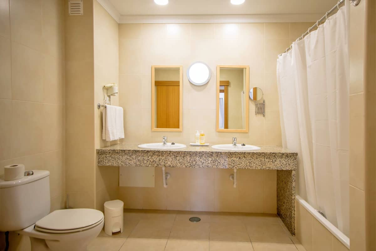 1 bedroom, desk, blackout curtains, iron/ironing board