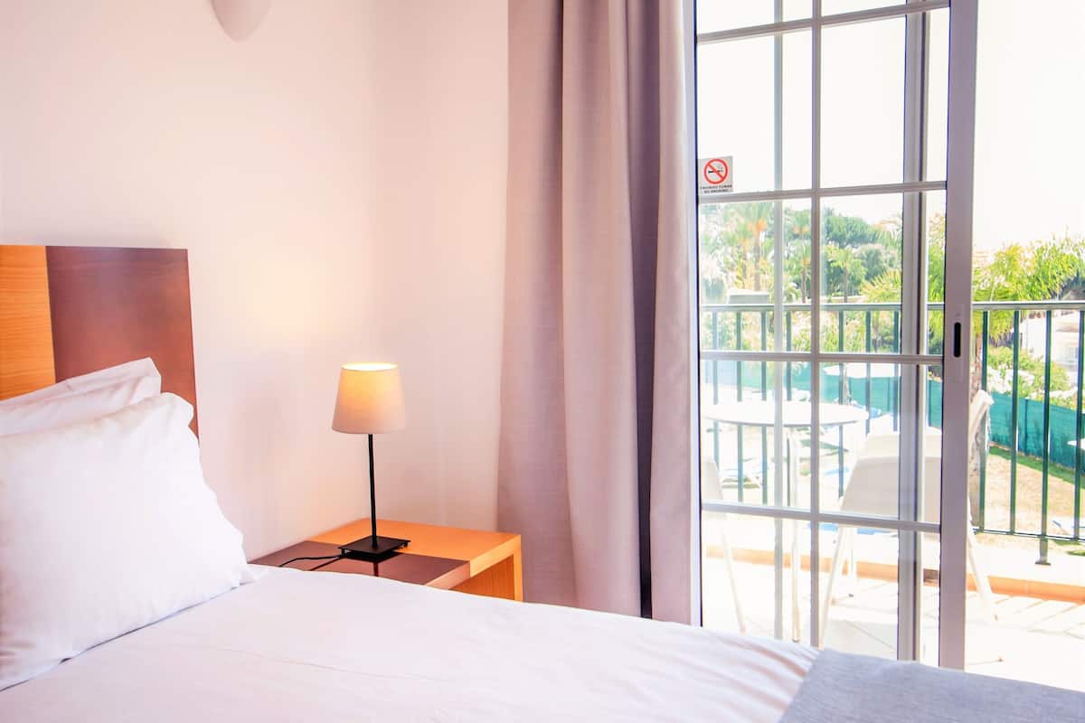 1 bedroom, desk, blackout curtains, iron/ironing board