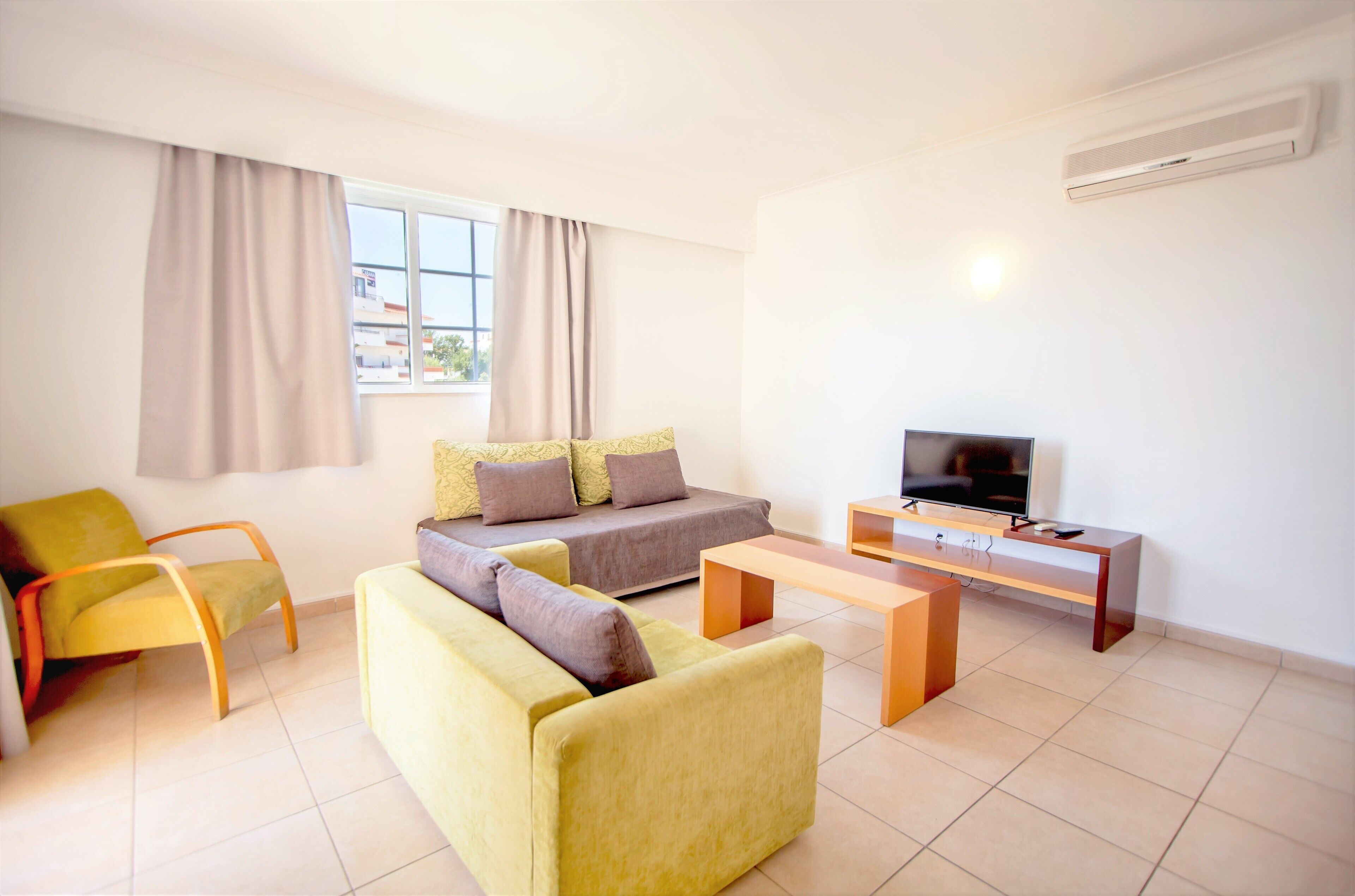 superior apartment, 1 bedroom, pool view | 1 bedroom, desk, blackout curtains, iron/ironing board