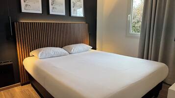 Standard Room, Multiple Beds | Individually decorated, desk, soundproofing, iron/ironing board