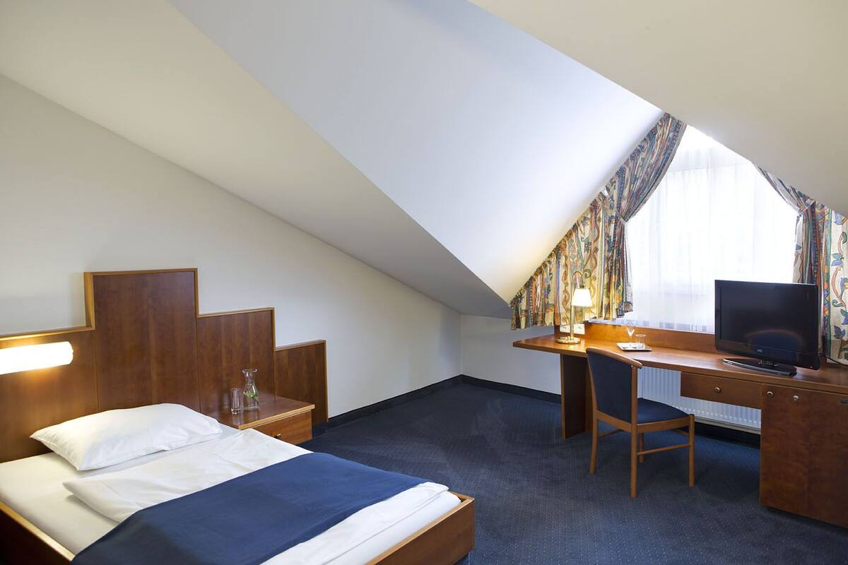 Single Room | Premium bedding, in-room safe, desk, iron/ironing board (on request)