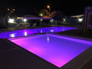 Seasonal outdoor pool, pool loungers