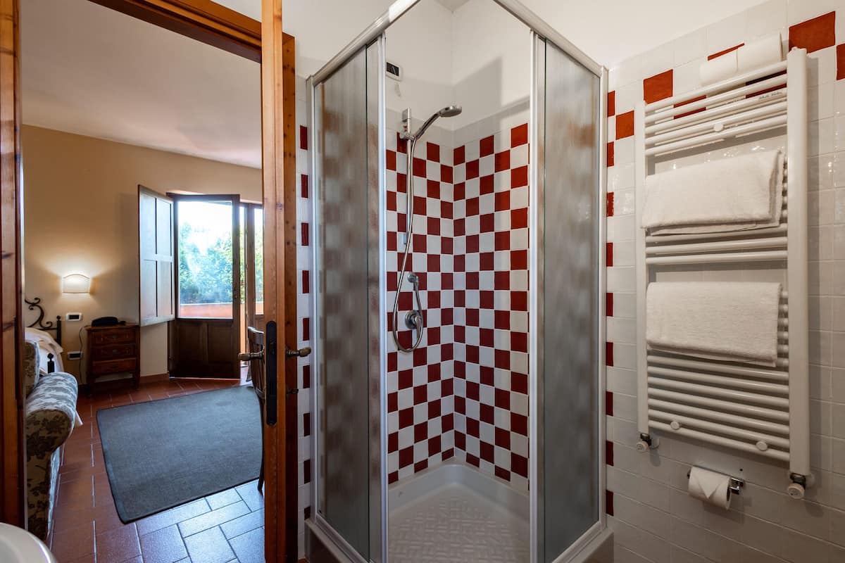 quadruple room | bathroom | shower, free toiletries, hair dryer, bidet