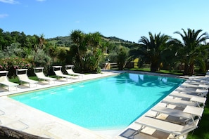 2 outdoor pools, open 8:00 AM to 8:00 PM, pool umbrellas, pool loungers