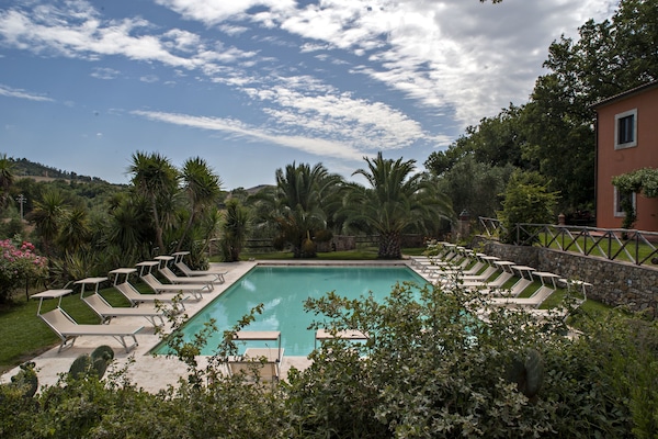 2 outdoor pools, open 8:00 AM to 8:00 PM, pool umbrellas, pool loungers