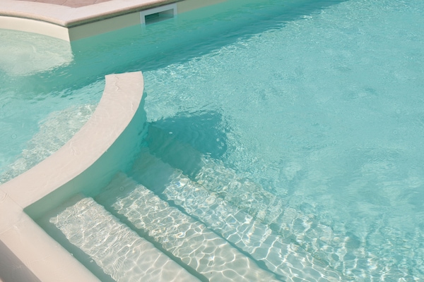 Seasonal outdoor pool, pool umbrellas, pool loungers