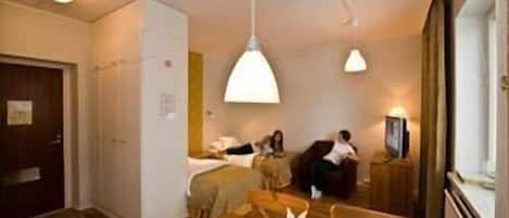 Premium bedding, down comforters, desk, laptop workspace