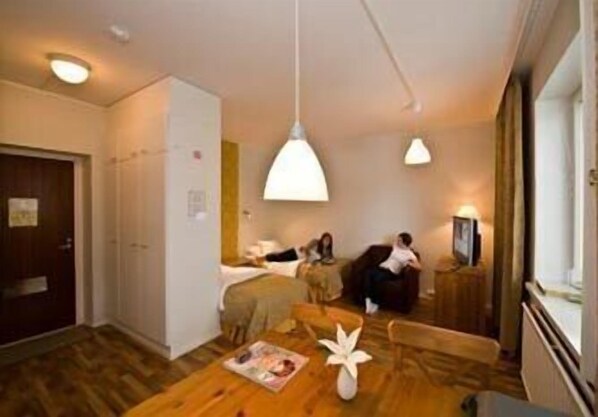 Premium bedding, down duvets, desk, laptop workspace