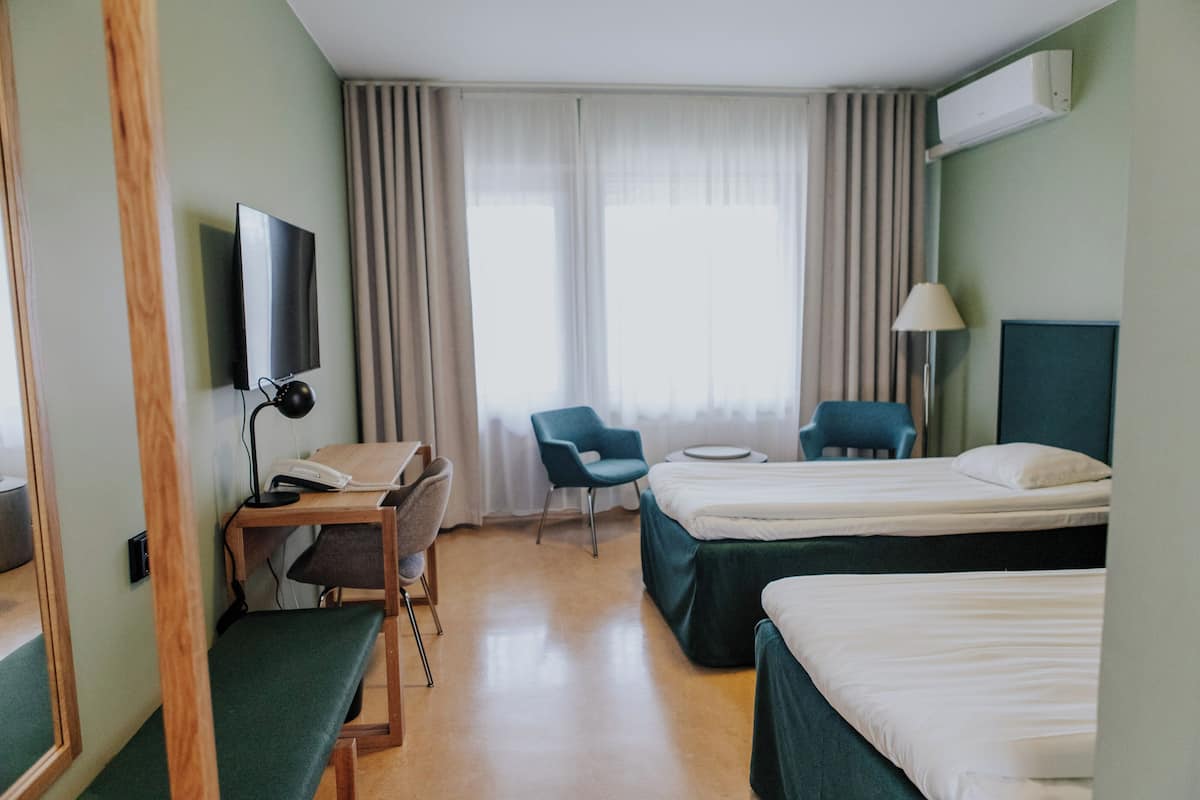 Standard Twin Room, 2 Twin Beds | Minibar, desk, blackout drapes, iron/ironing board