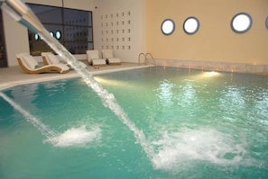 Indoor pool, open 10:30 AM to 9:00 PM, pool loungers