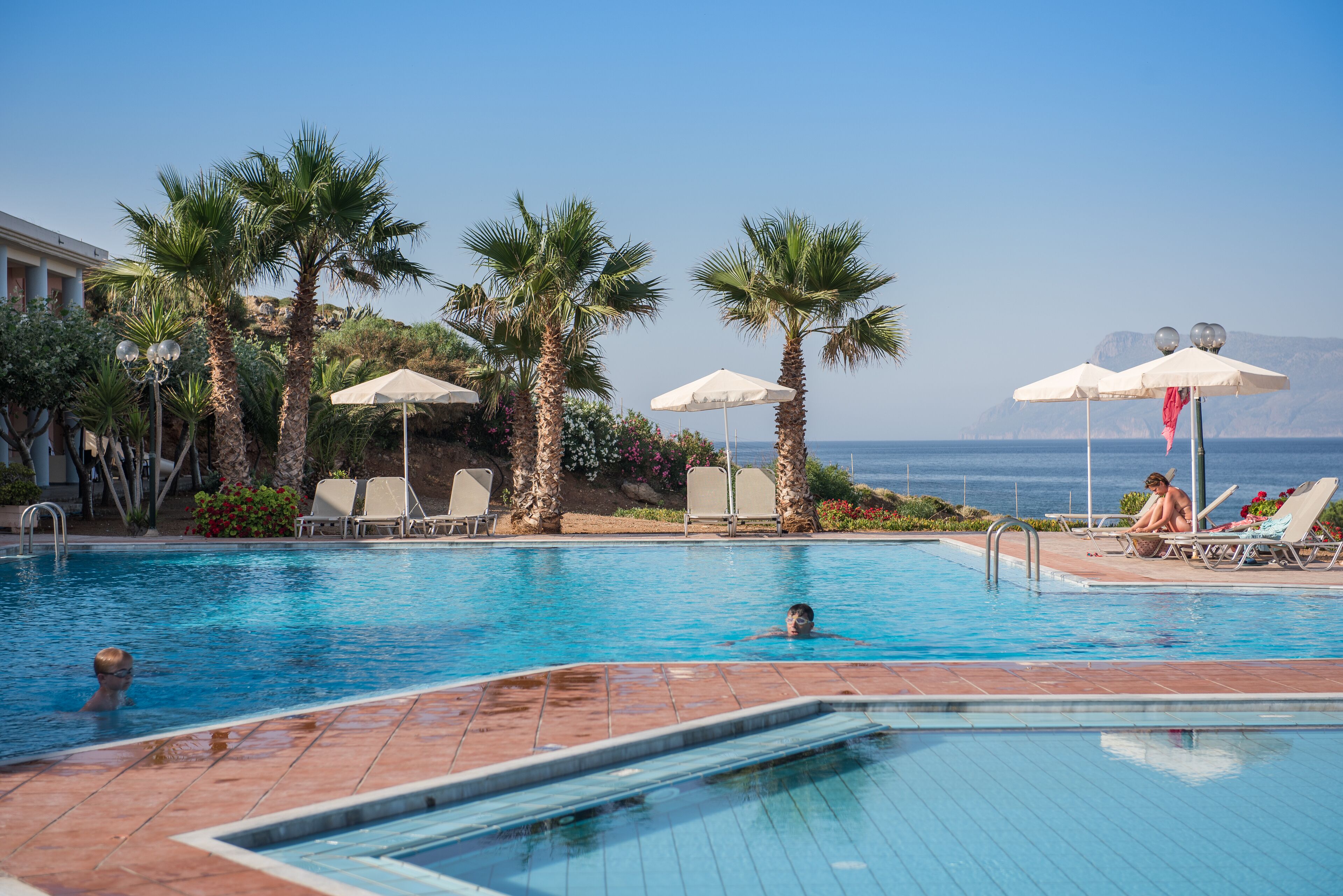 outdoor pool, pool umbrellas