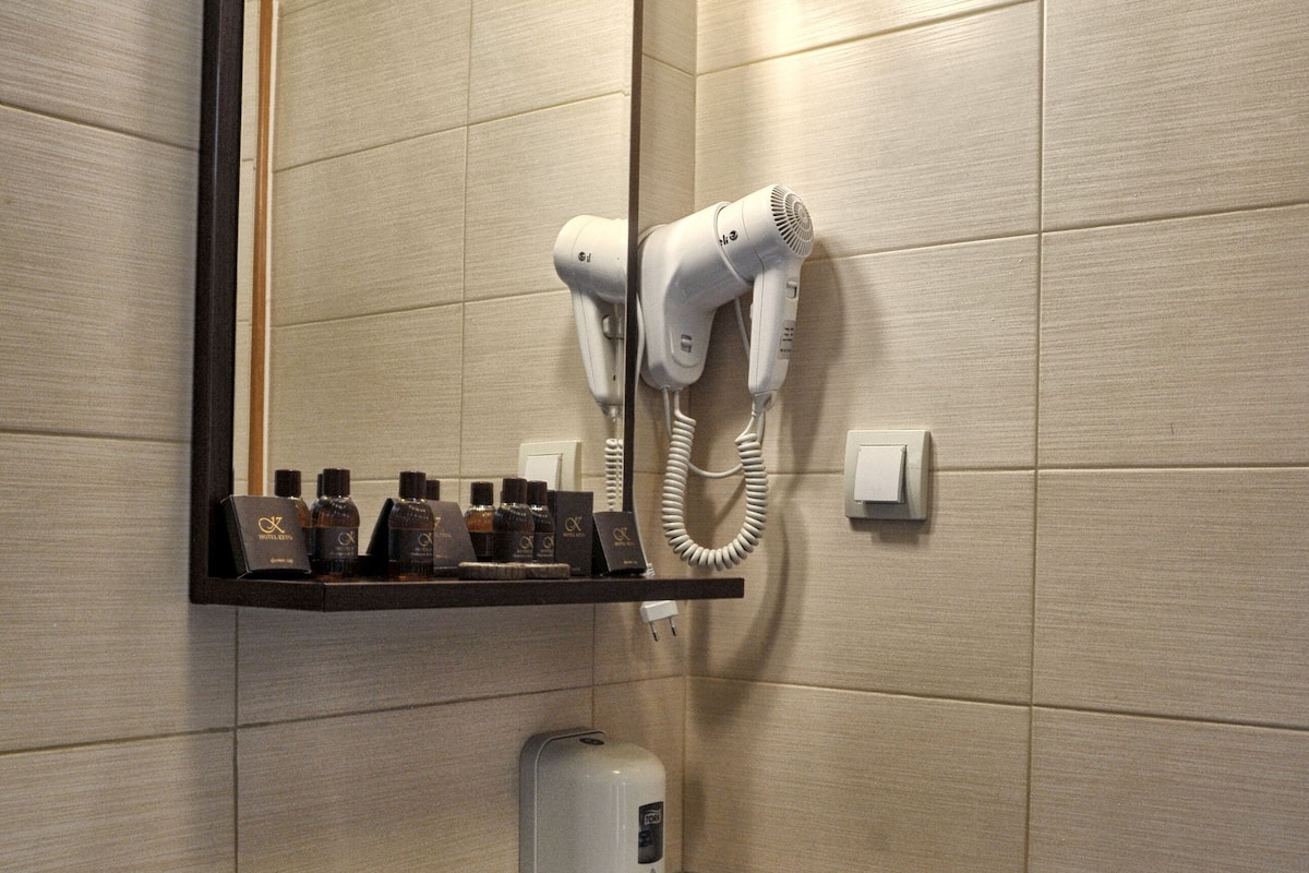 standard apartment | bathroom | shower, hair dryer, towels