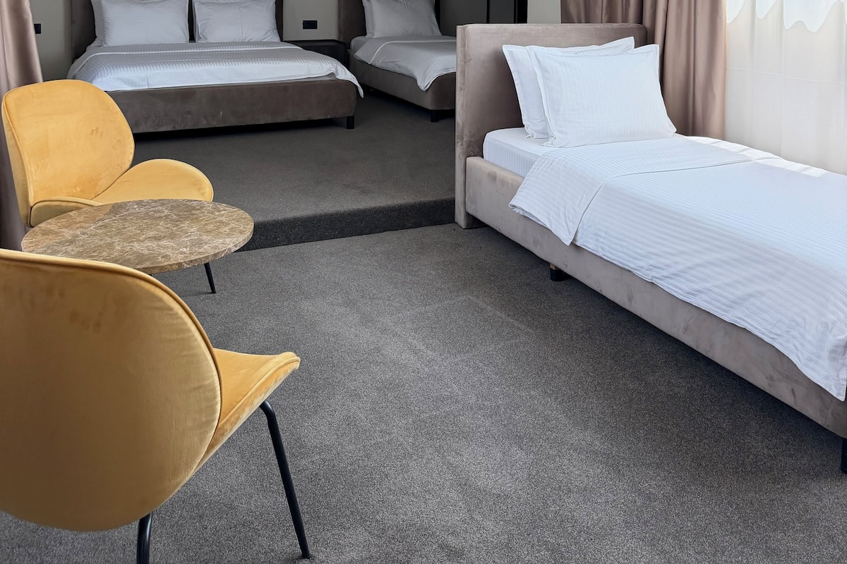 Family Room | Minibar, in-room safe, desk, blackout curtains
