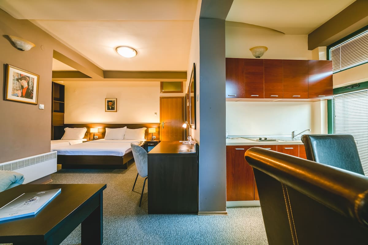 standard apartment | minibar, in-room safe, desk, blackout curtains