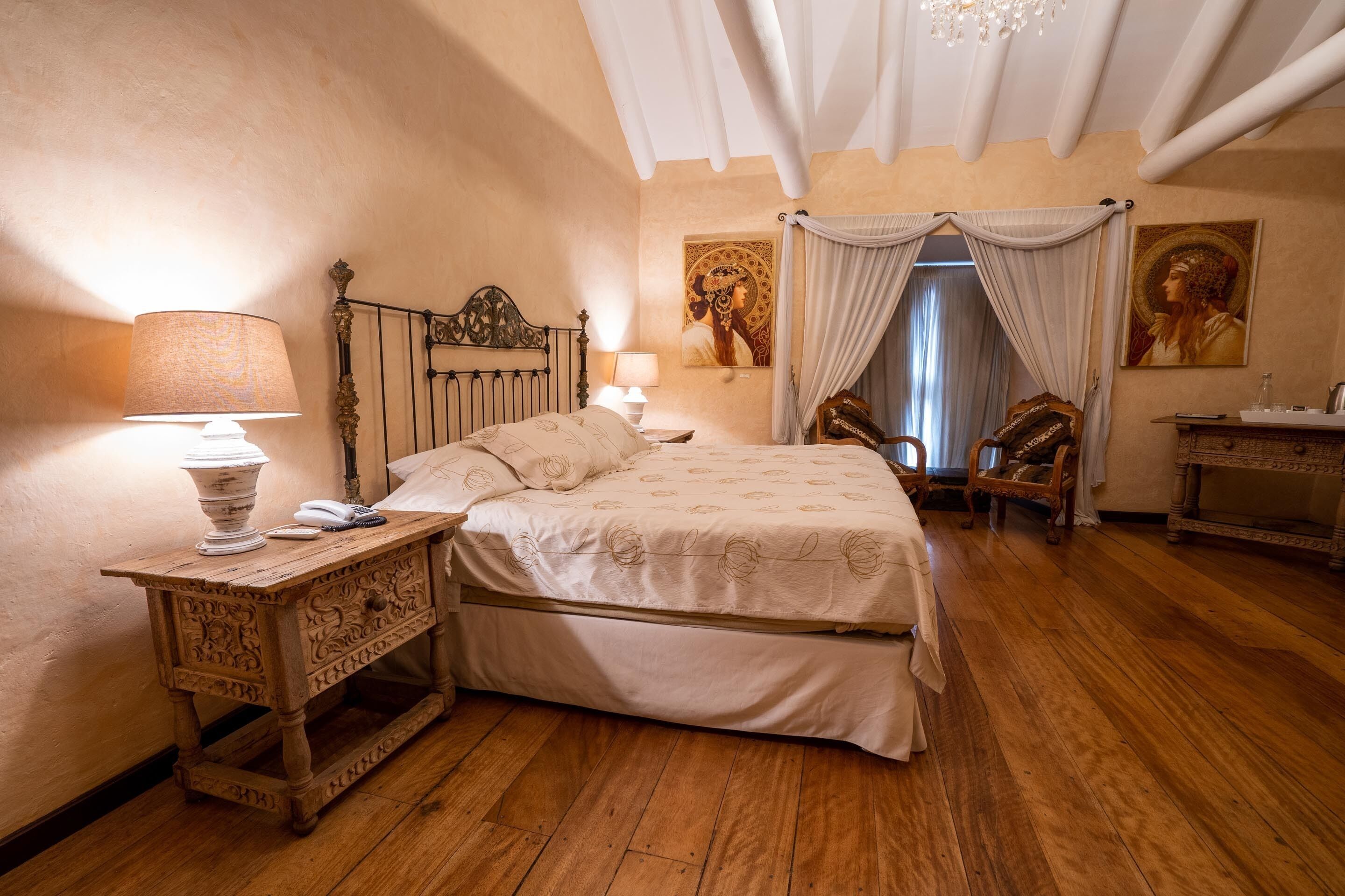 premium suite, 1 king bed, jetted tub | in-room safe, individually decorated, individually furnished, free wifi