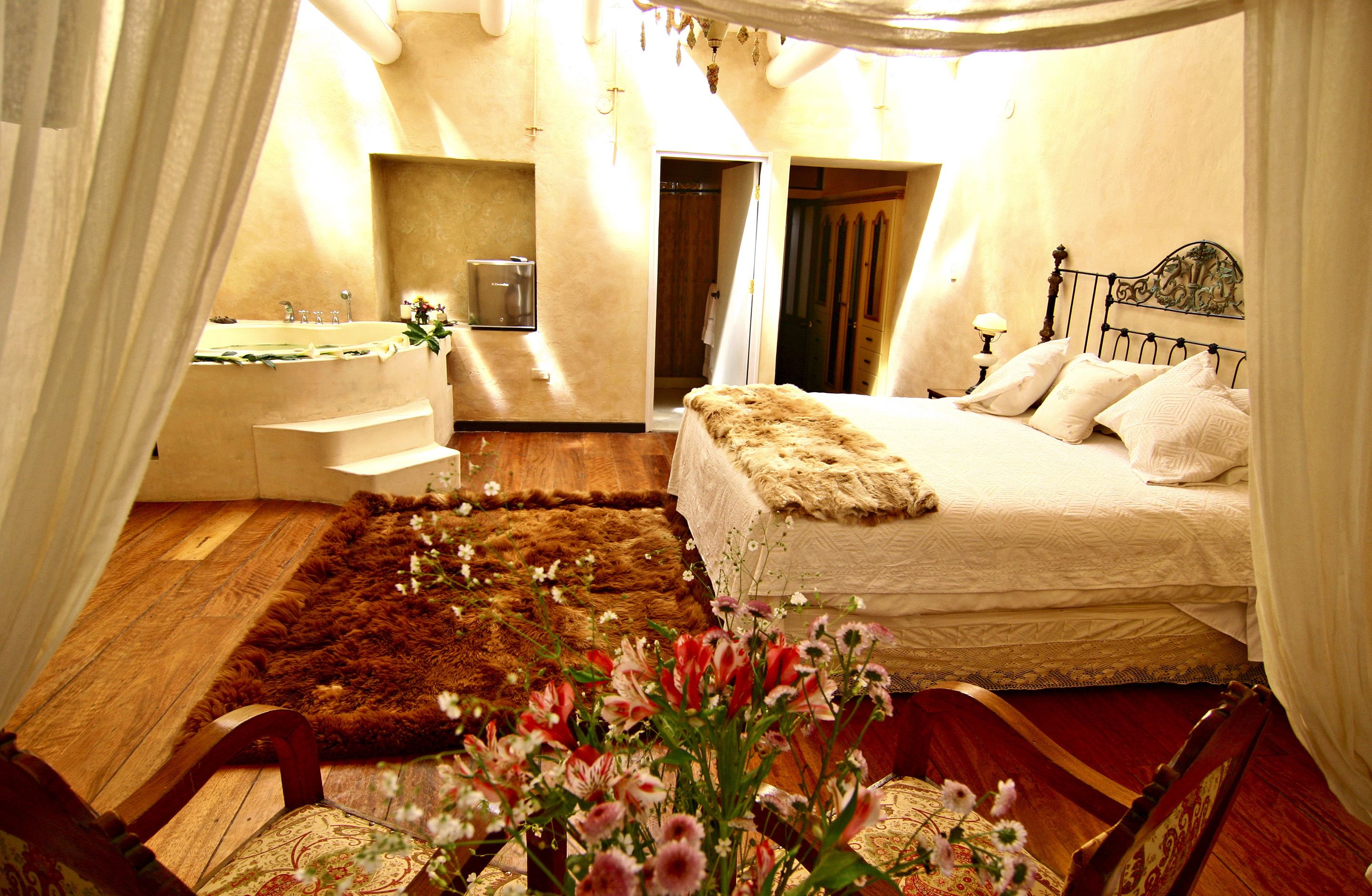 premium suite, 1 king bed, jetted tub | in-room safe, individually decorated, individually furnished, free wifi