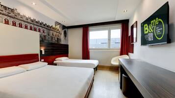 Down duvets, Select Comfort beds, in-room safe, desk