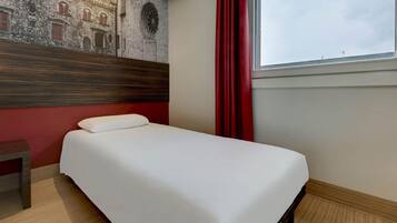 Down duvets, Select Comfort beds, in-room safe, desk