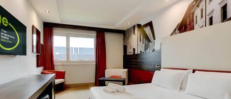 Down comforters, Select Comfort beds, in-room safe, desk