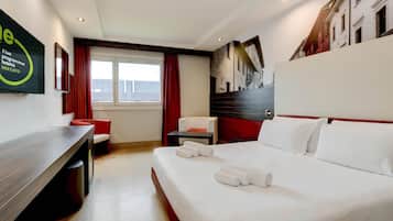 Down duvets, Select Comfort beds, in-room safe, desk