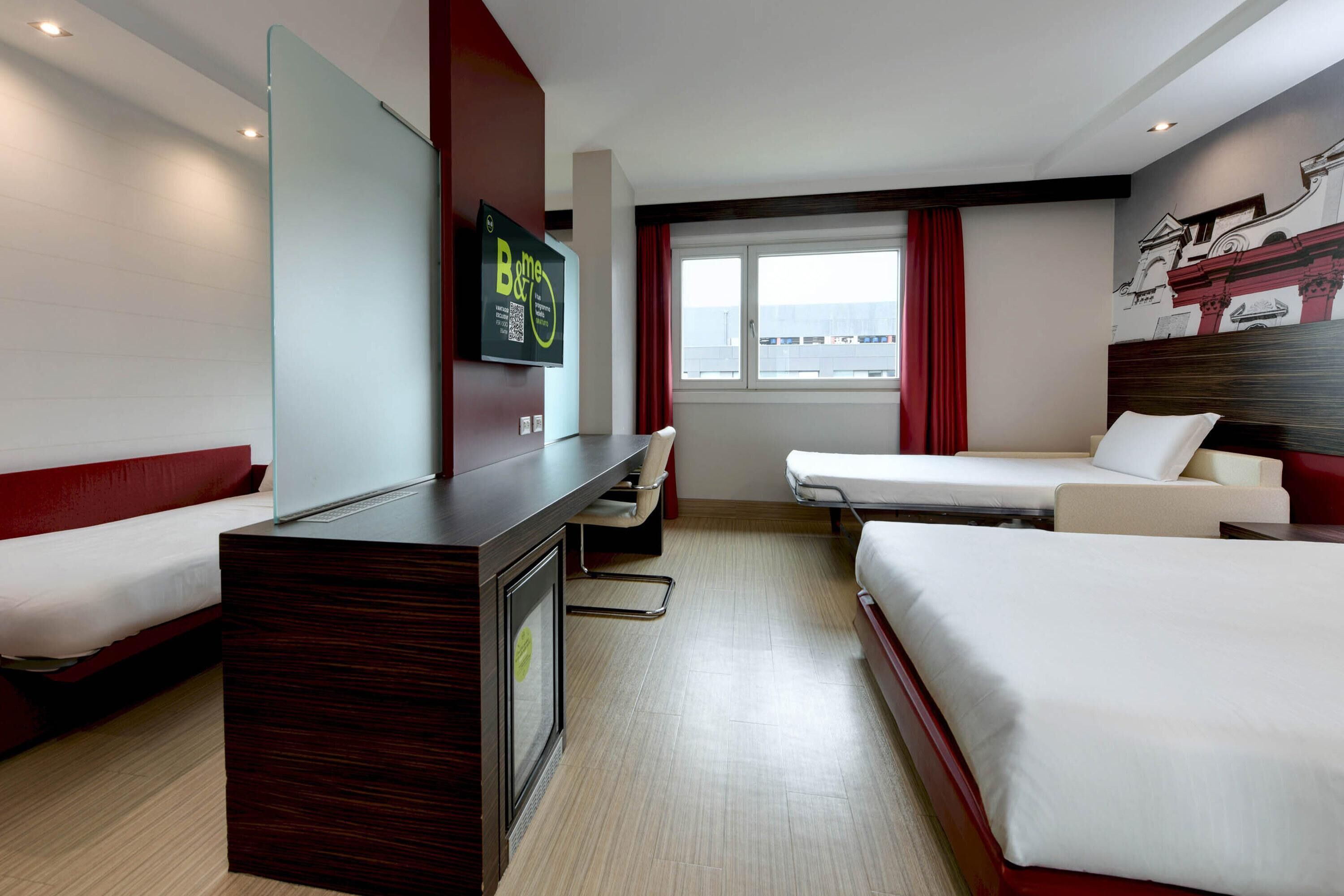 quadruple room | 1 bedroom, down duvets, select comfort beds, in-room safe