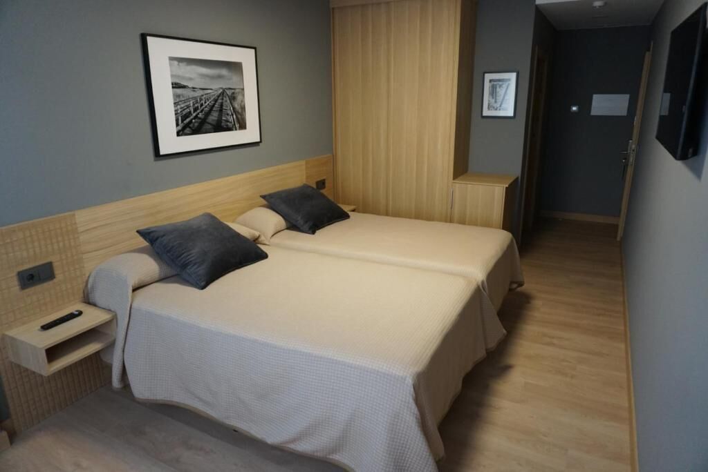 Frette Italian sheets, premium bedding, Tempur-Pedic beds, minibar