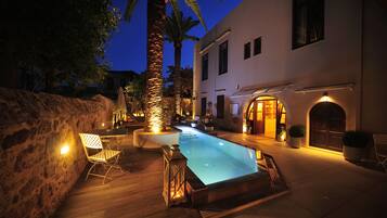 Outdoor pool, pool umbrellas, pool loungers