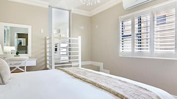 Deluxe Apartment, 1 Bedroom | Hypo-allergenic bedding, memory-foam beds, in-room safe, soundproofing