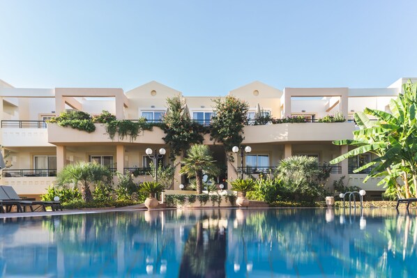 Outdoor pool, pool umbrellas, sun loungers