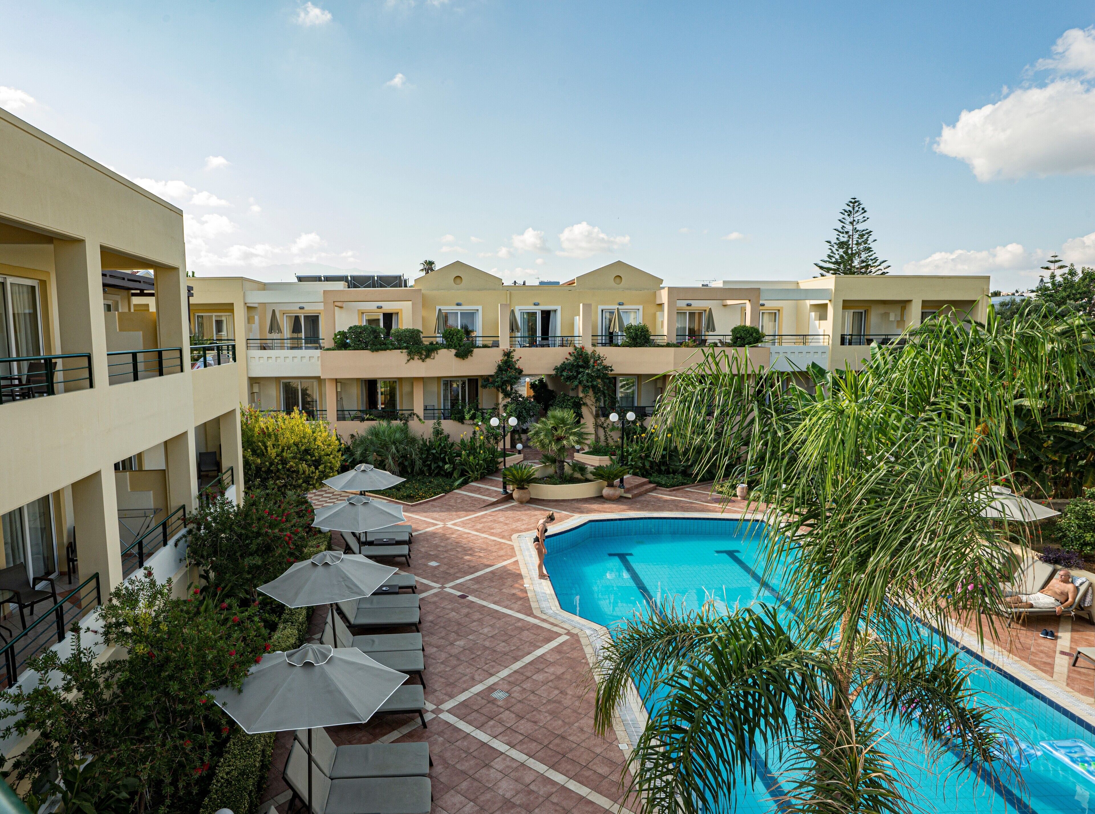 outdoor pool, pool umbrellas, pool loungers