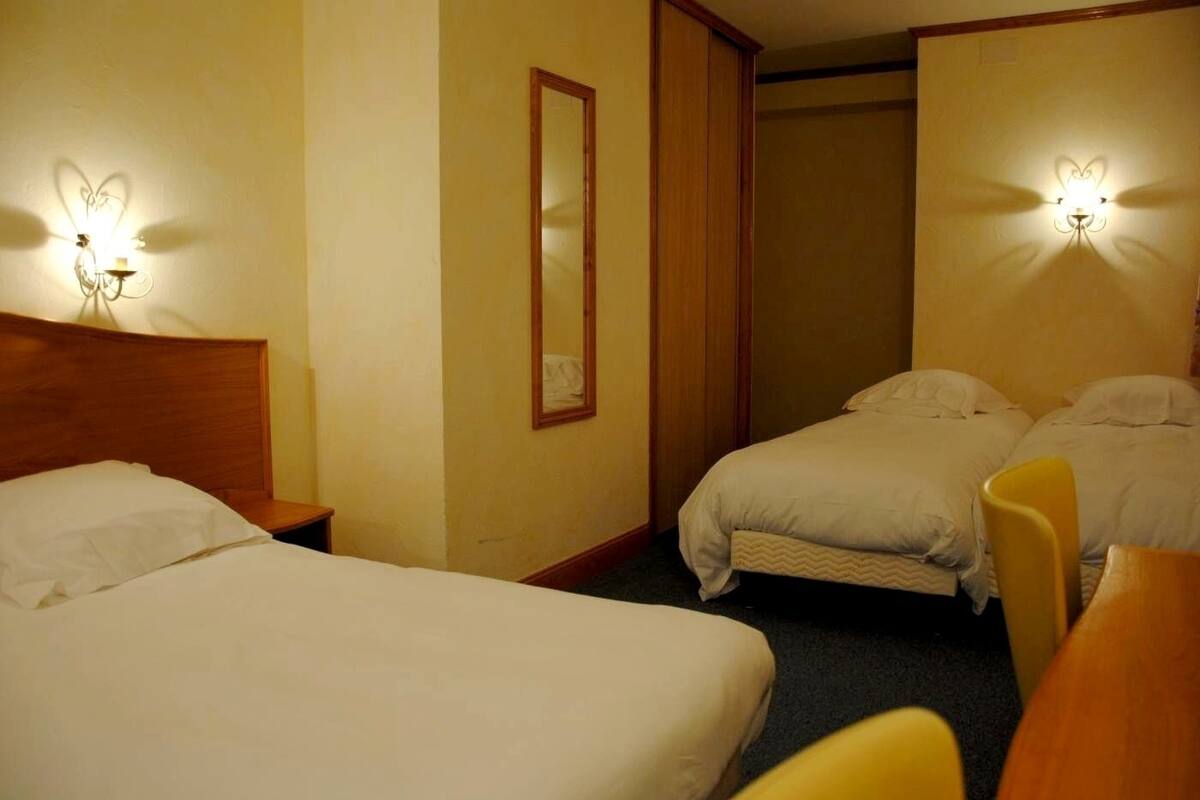 Family Quadruple Room | Desk, iron/ironing board (on request), WiFi (free), bed sheets