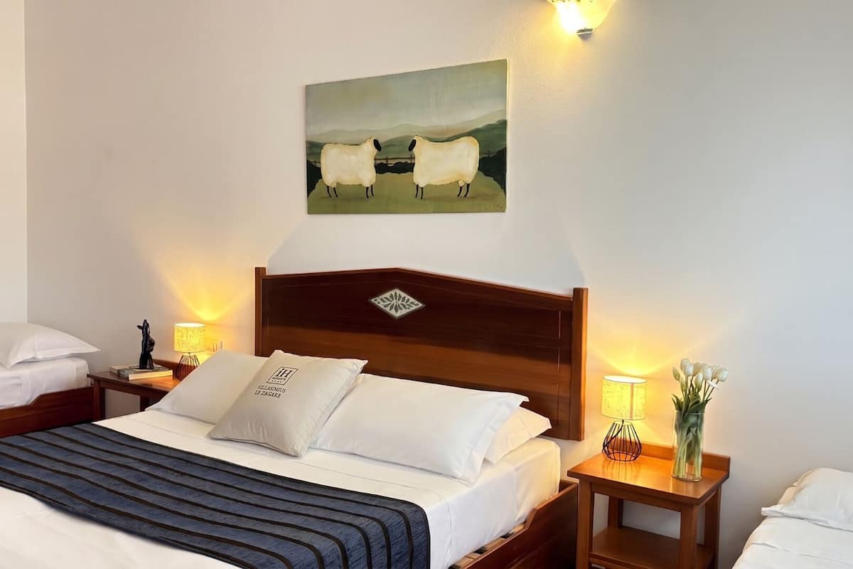 Standard Quadruple Room | Minibar, in-room safe, desk, soundproofing