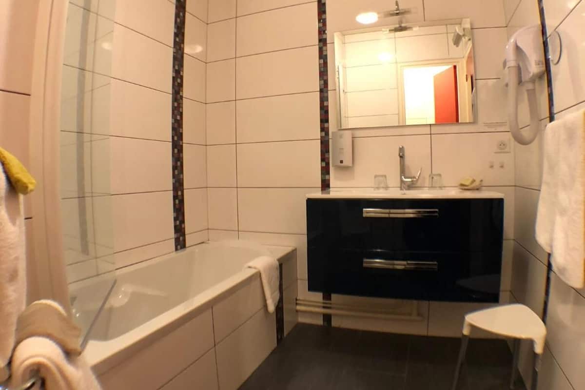superior double room | bathroom | free toiletries, hair dryer, towels