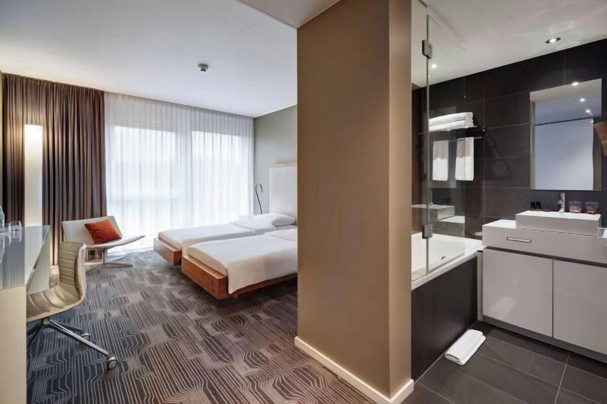 Premium bedding, desk, blackout curtains, soundproofing