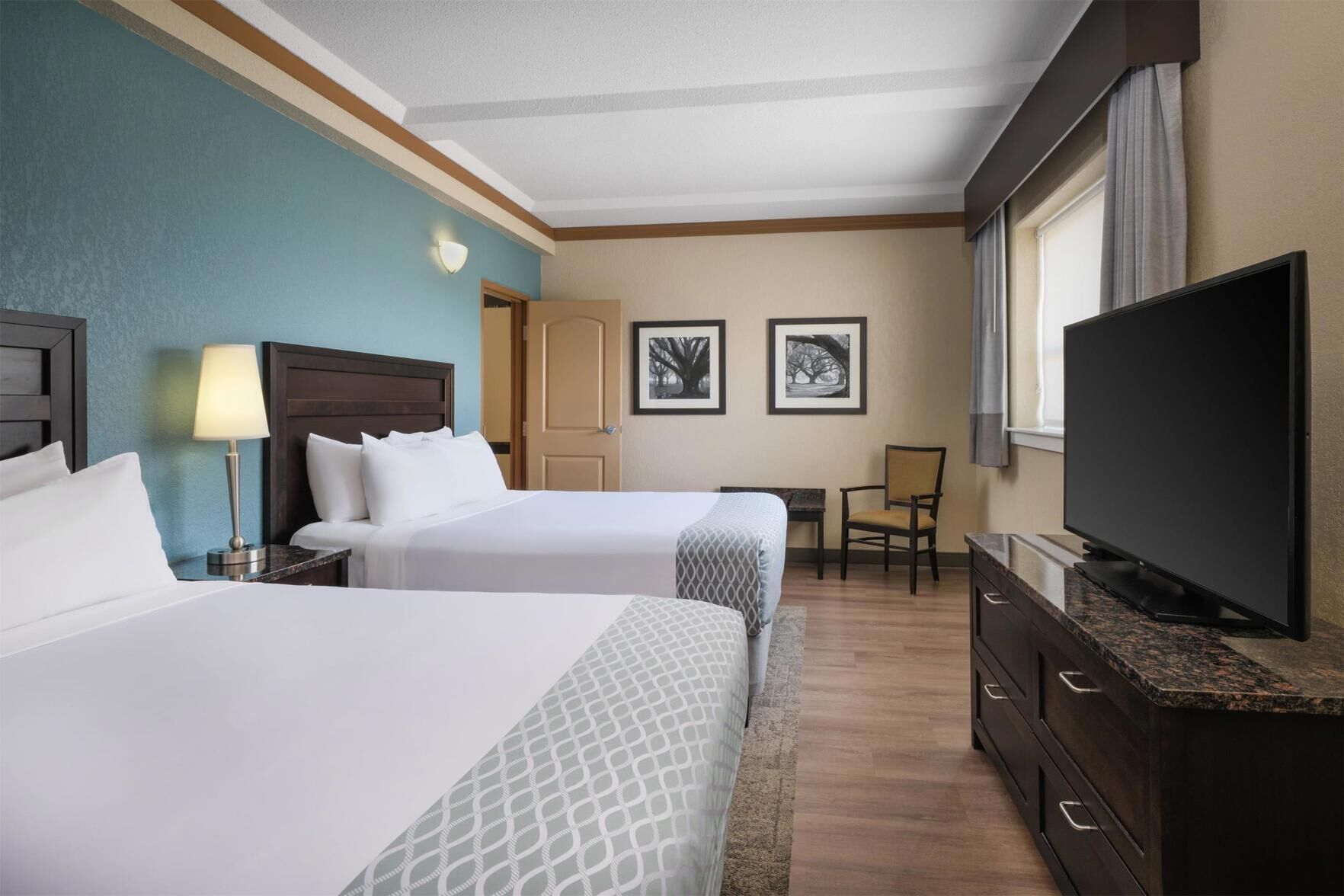 Pillowtop beds, desk, laptop workspace, blackout drapes