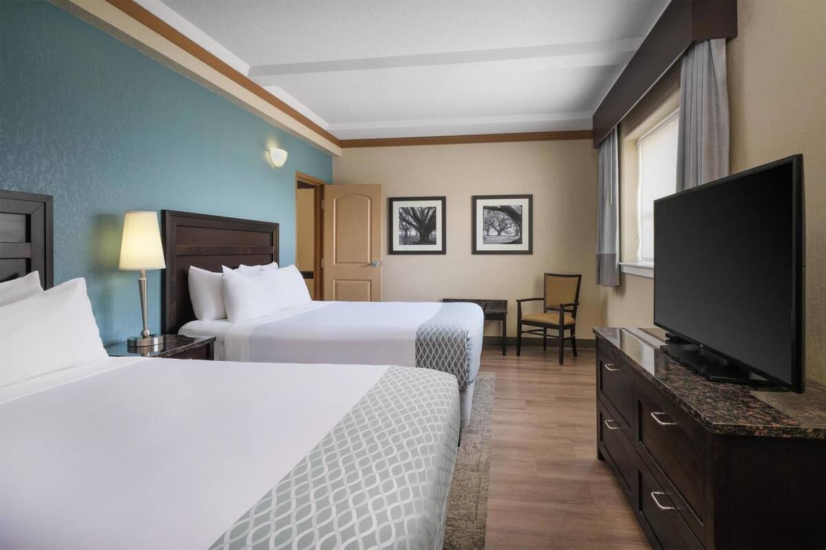 Pillowtop beds, desk, laptop workspace, blackout drapes