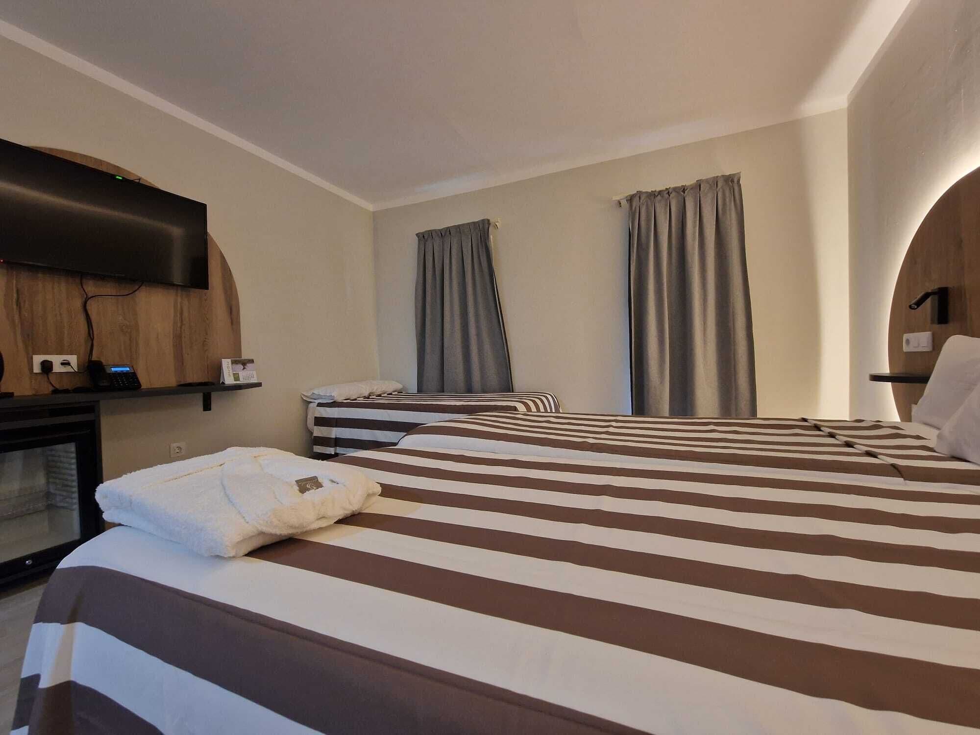 Basic Triple Room | Premium bedding, minibar, in-room safe, desk