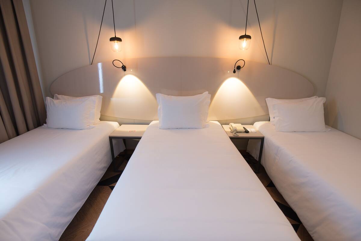 triple room | minibar, in-room safe, desk, blackout curtains