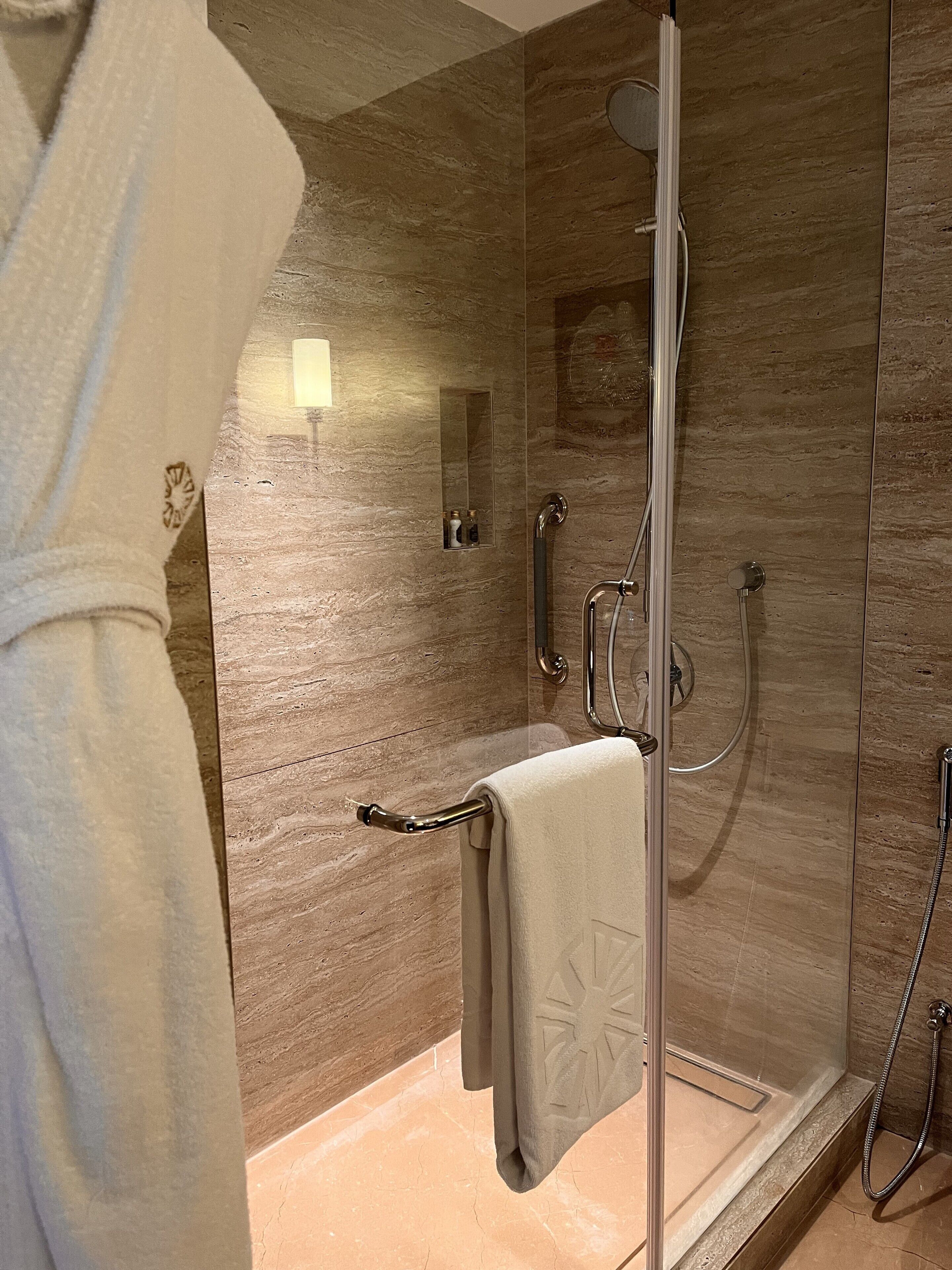 free toiletries, hair dryer, slippers, bidet