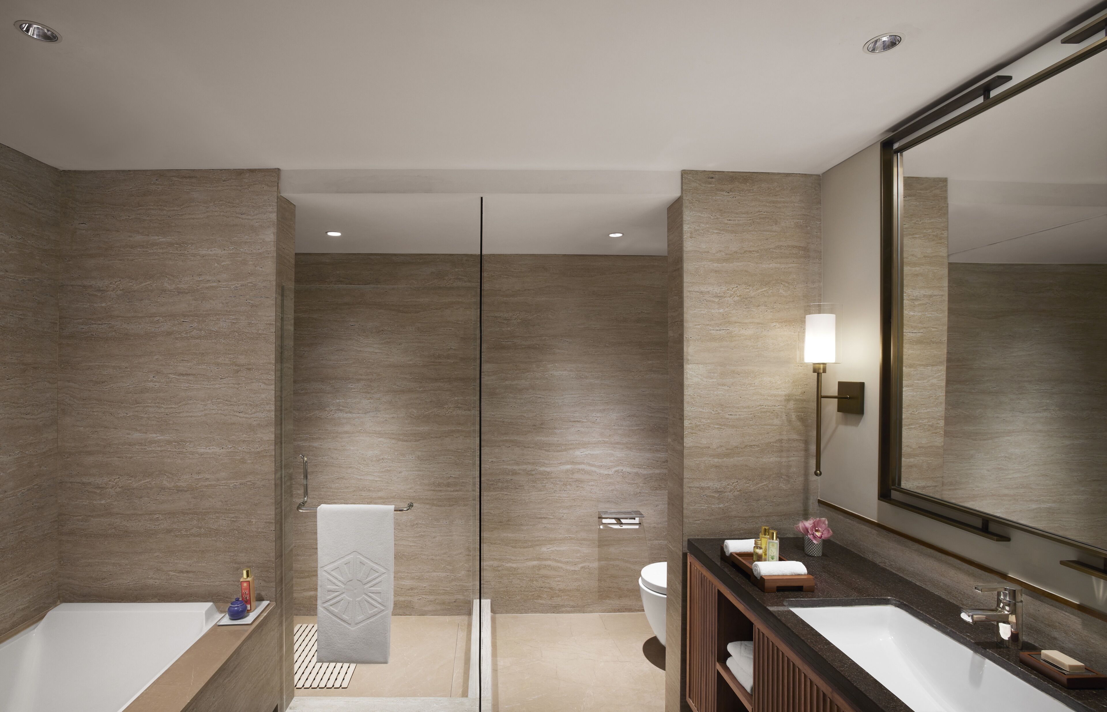 deluxe suite | bathroom | free toiletries, hair dryer, slippers, bidet