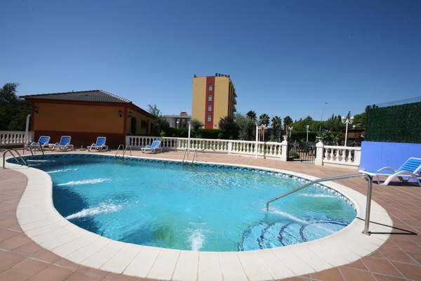 Outdoor pool, open 9 AM to 9:30 PM, sun loungers