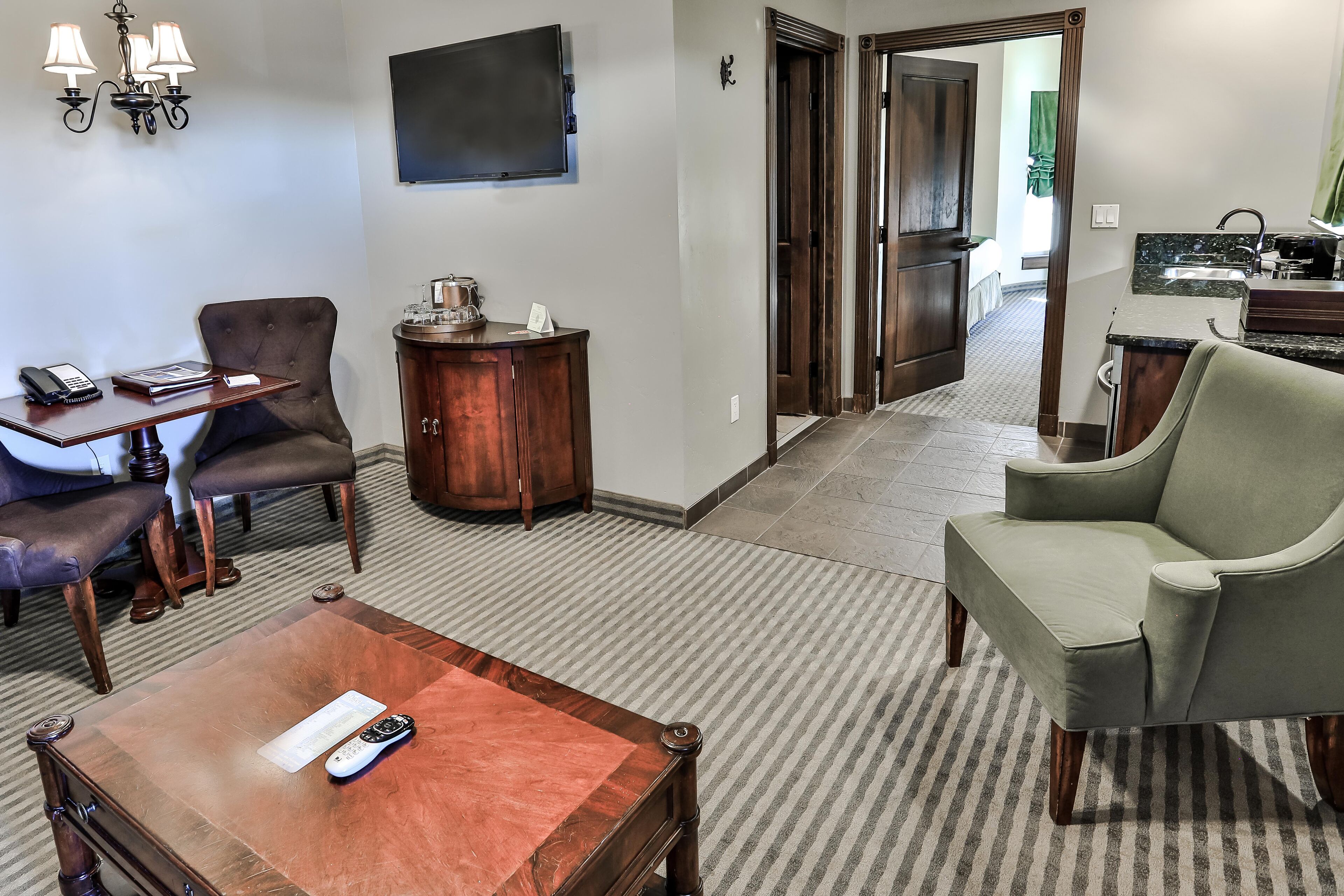 luxury suite, 1 king bed with sofa bed, non smoking, kitchenette | hypo-allergenic bedding, desk, blackout curtains, iron/ironing board