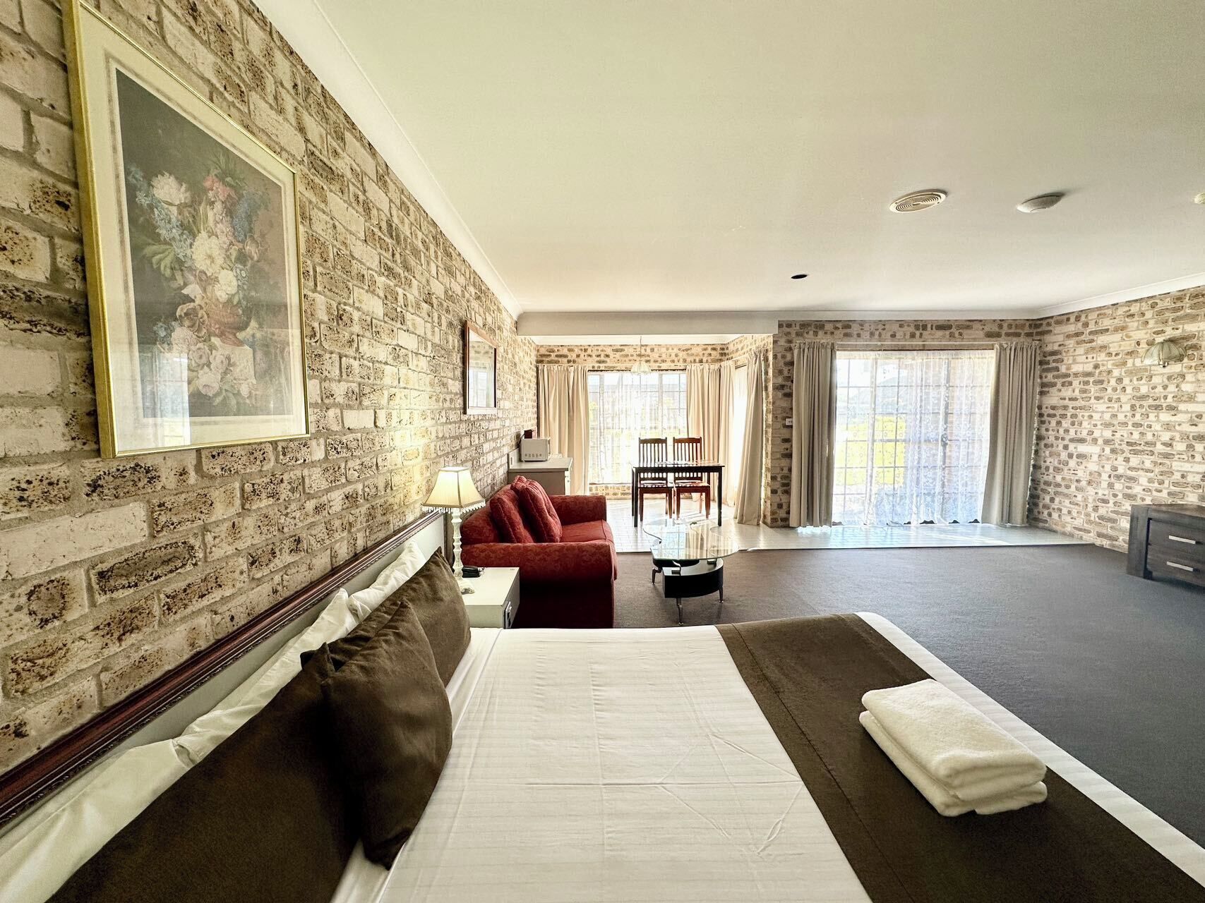 Executive Room + Spa | Desk, blackout curtains, iron/ironing board, WiFi