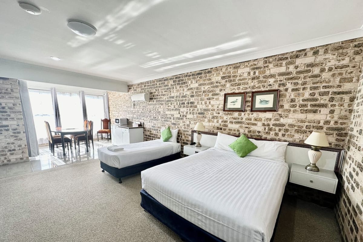 Standard 2 Bedroom Family Room | Desk, blackout curtains, iron/ironing board, WiFi