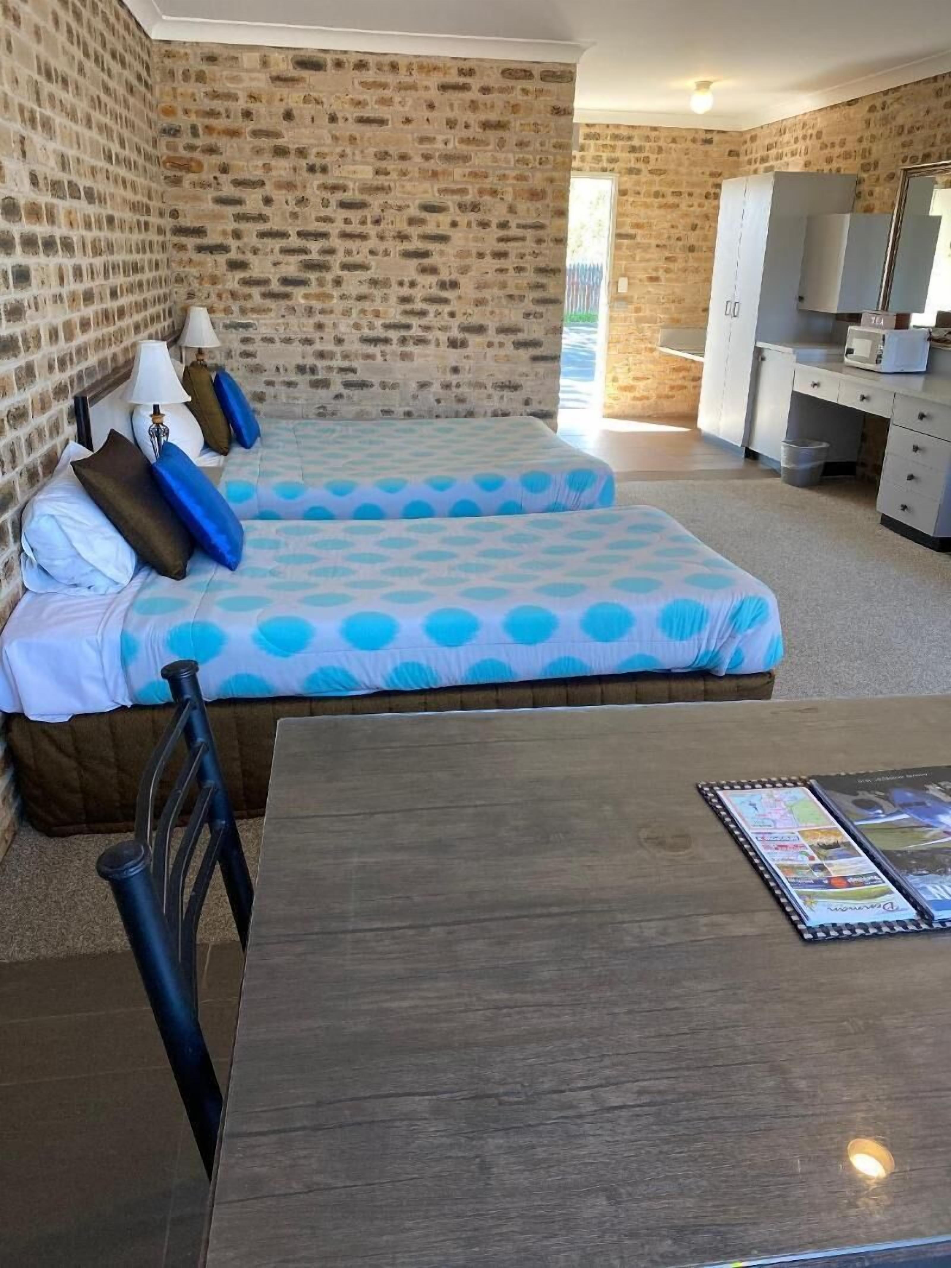 Desk, blackout drapes, iron/ironing board, WiFi